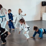 Kids develop discipline and respect through active training routines.